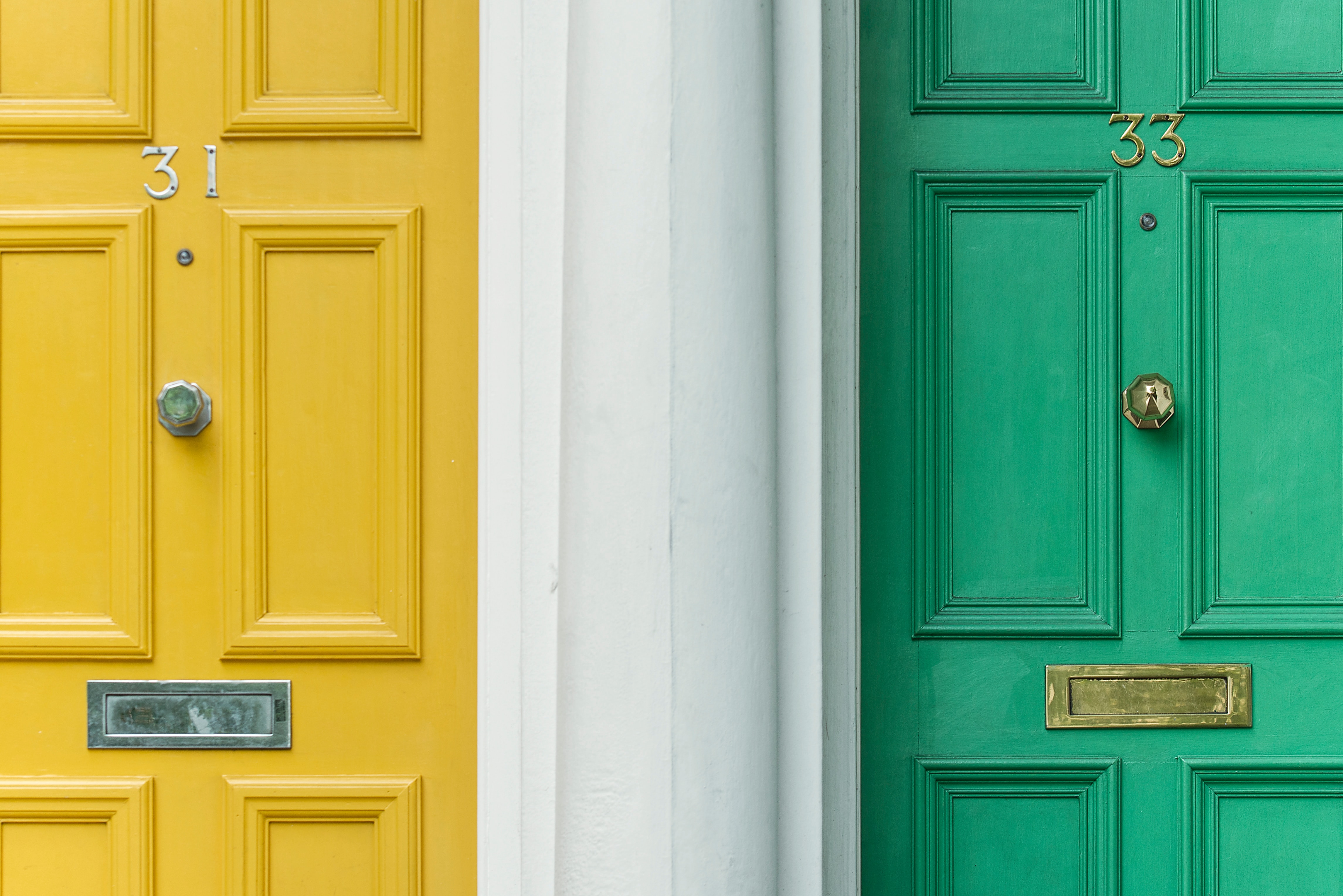 letterboxes in painted wooden doors