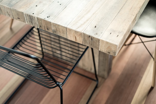 industrial style table and chair, combining wood and metal