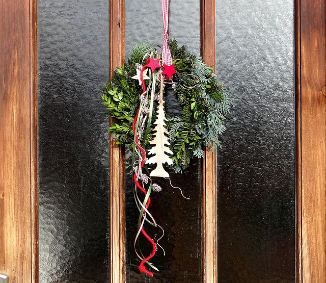 festive wreath hung with ribbon