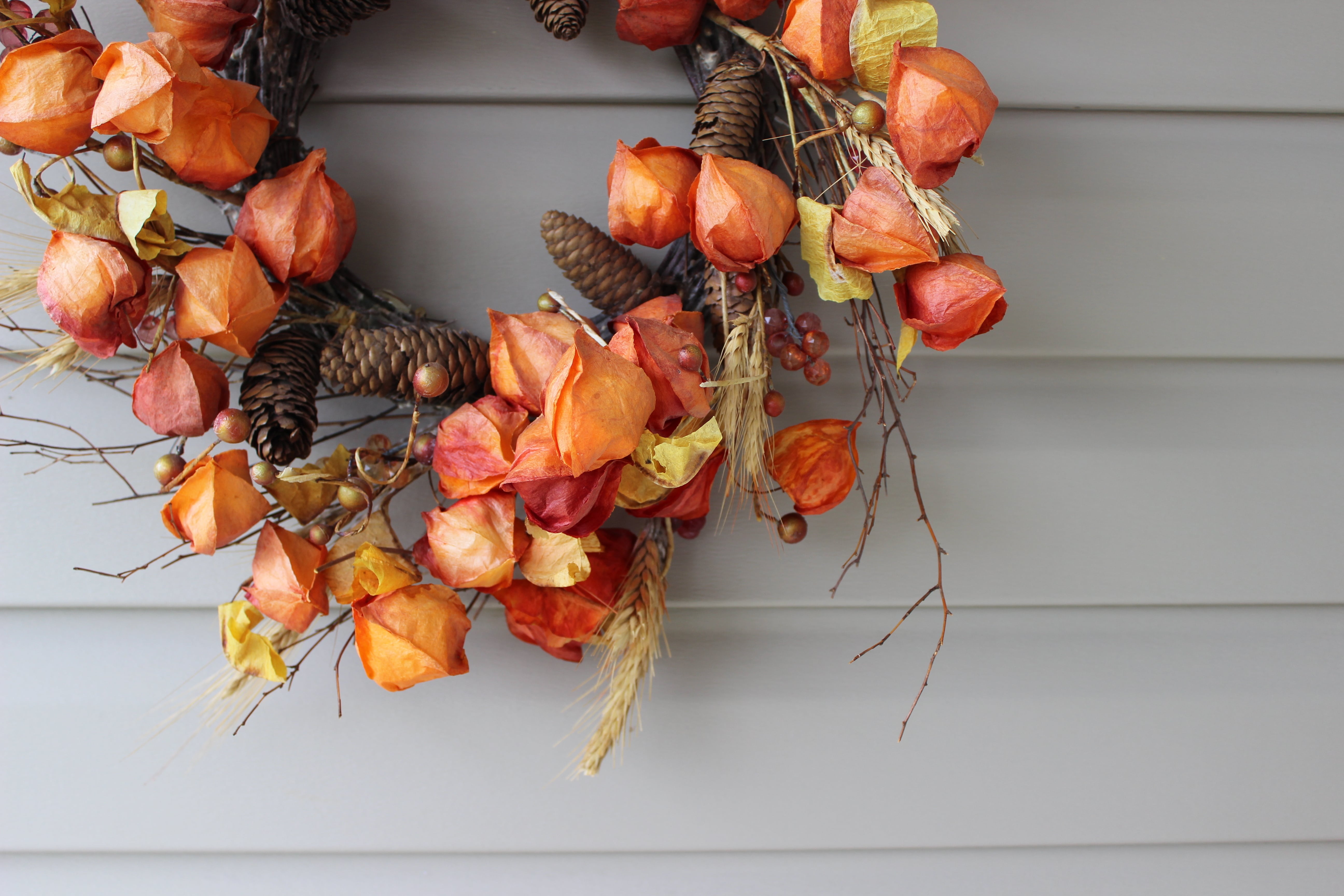 close up of hanging autumnal wreath
