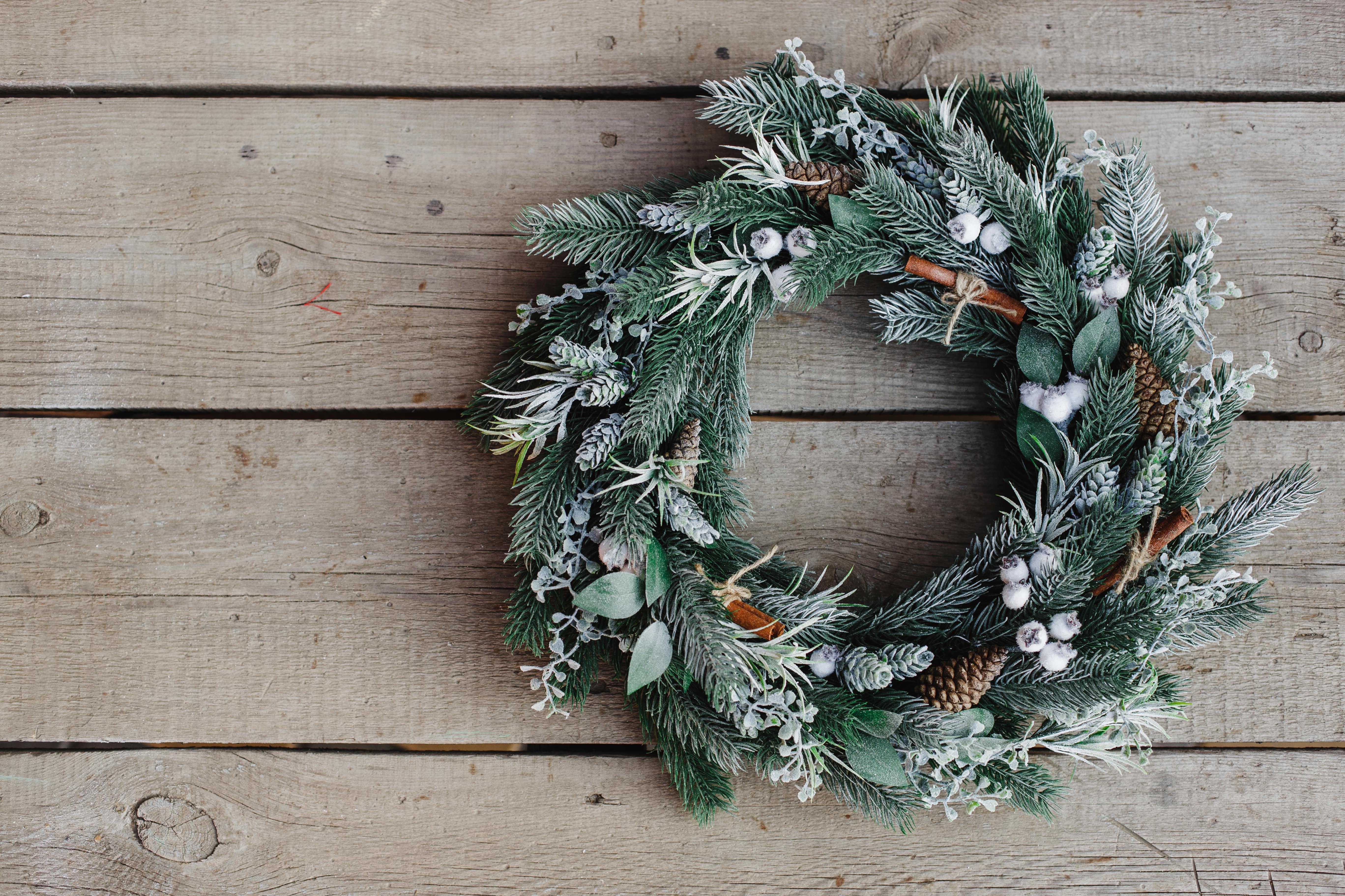 winter themed wreath with foliage