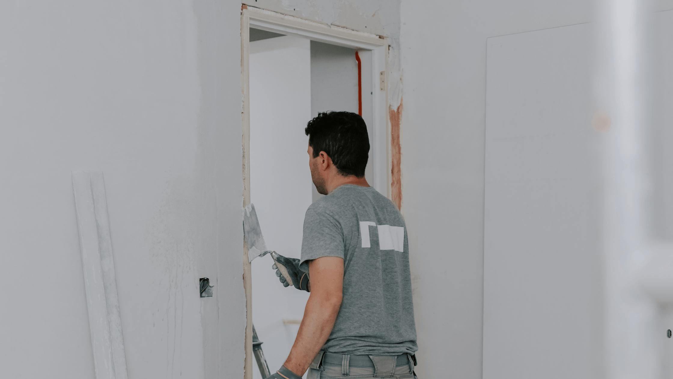 Tradesman replacing an internal door frame - Express Doors Direct