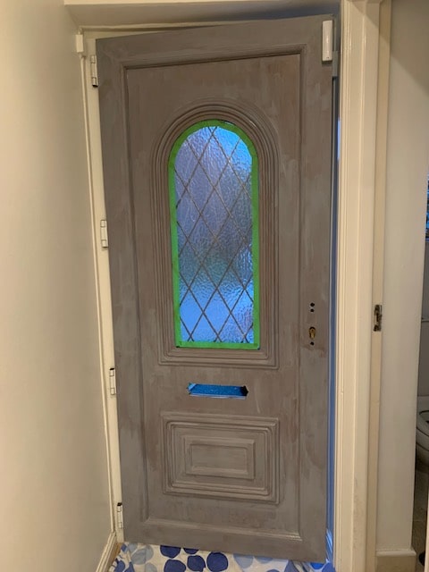 first coat of paint on a front door